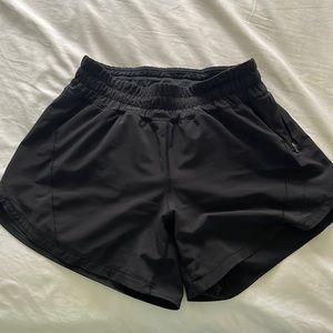 lululemon track that 5” mid-rise shorts! size 6